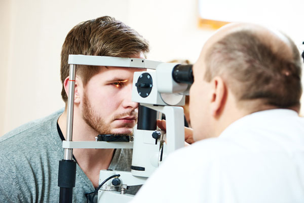 bigstock-Male-optometrist-optician-doct-92340083-(1)